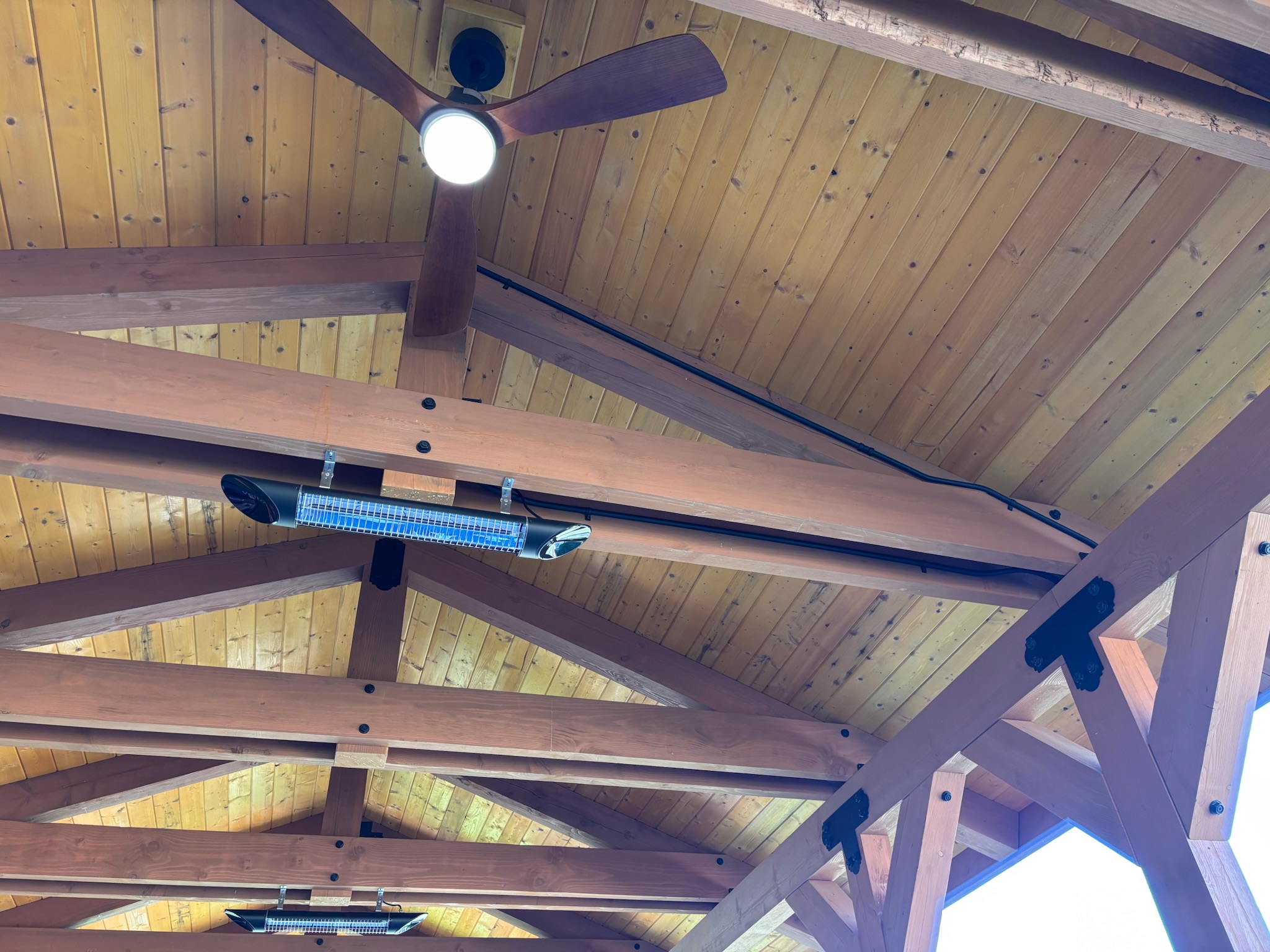 Outdoor electrical fan and heater installation by Elite Electric